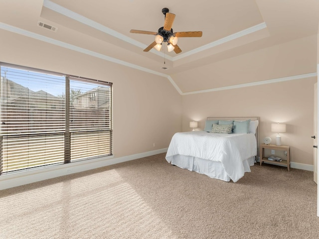 unfurnished bedroom featuring ceiling fan, ornamental molding, carpet flooring, and a raised ceiling