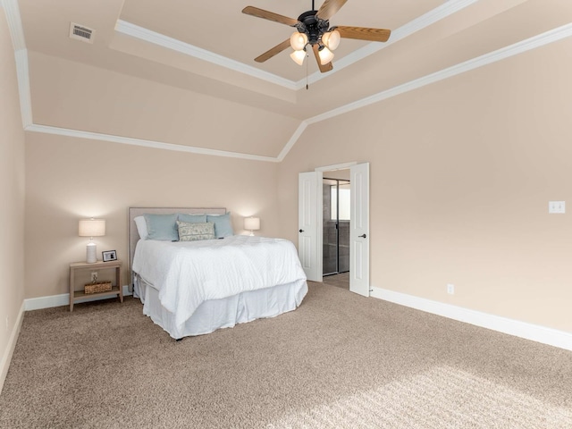 carpeted bedroom featuring a raised ceiling, ornamental molding, lofted ceiling, and ceiling fan