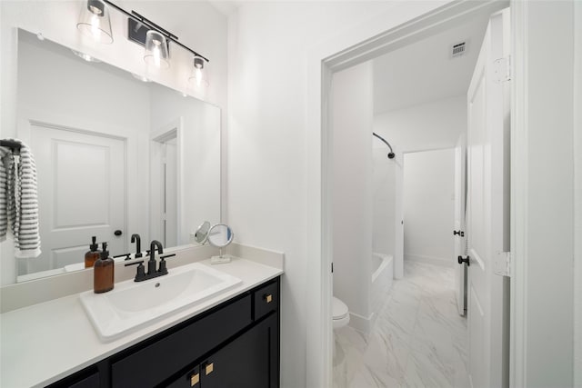 full bathroom featuring shower / washtub combination, toilet, and vanity