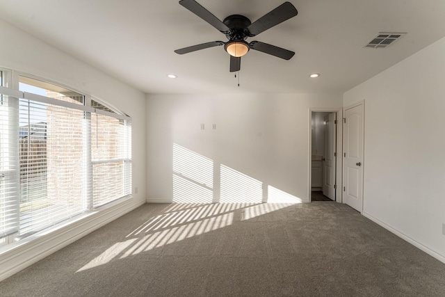 spare room with a healthy amount of sunlight and carpet floors