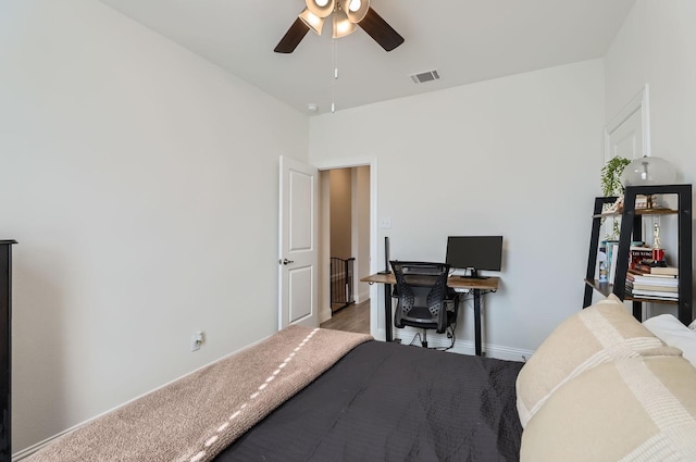 bedroom featuring wood-type flooring and ceiling fan