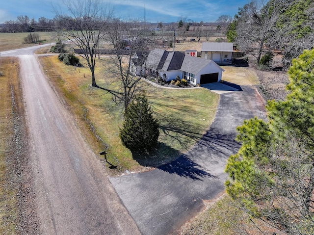 birds eye view of property featuring a rural view