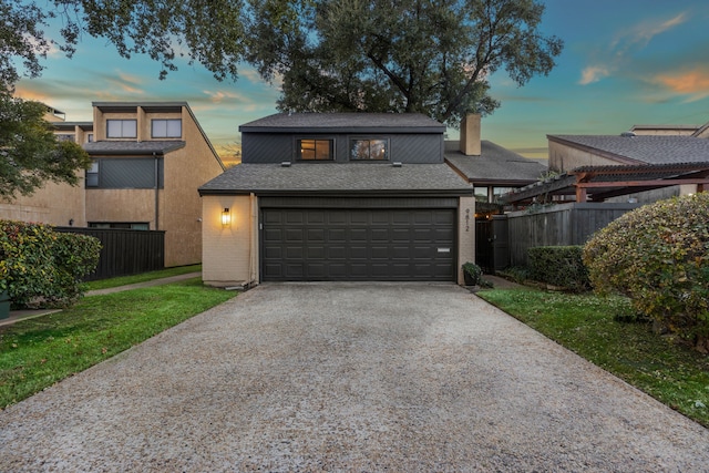 view of front of house with a lawn