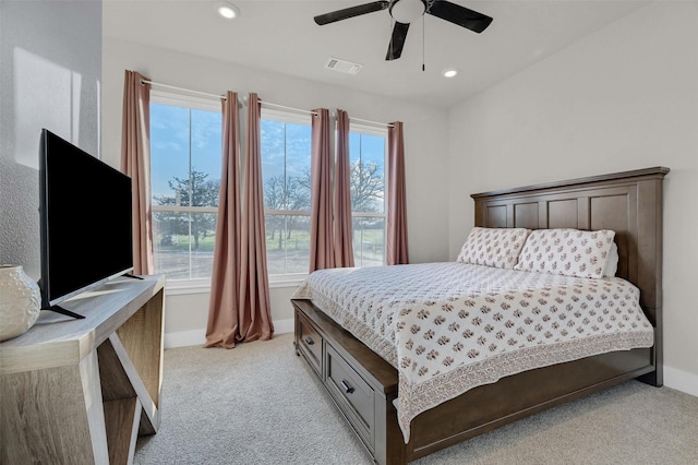 carpeted bedroom featuring ceiling fan