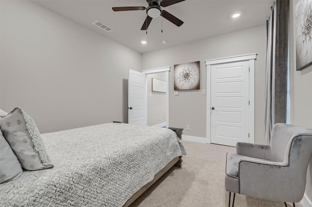 carpeted bedroom featuring ceiling fan