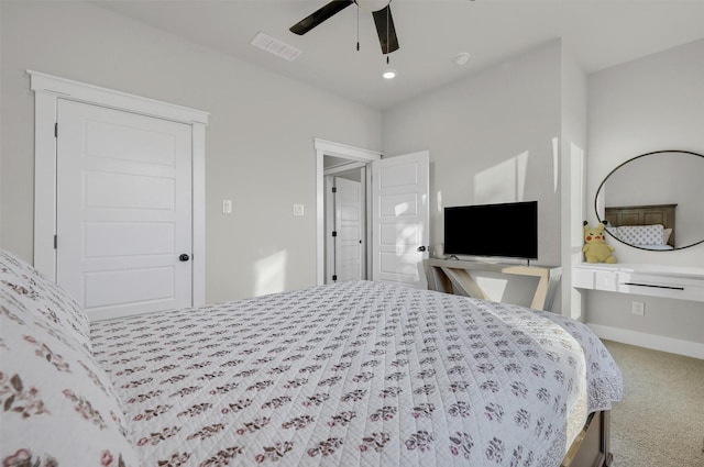 carpeted bedroom featuring ceiling fan