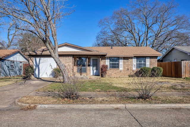 ranch-style house with a garage