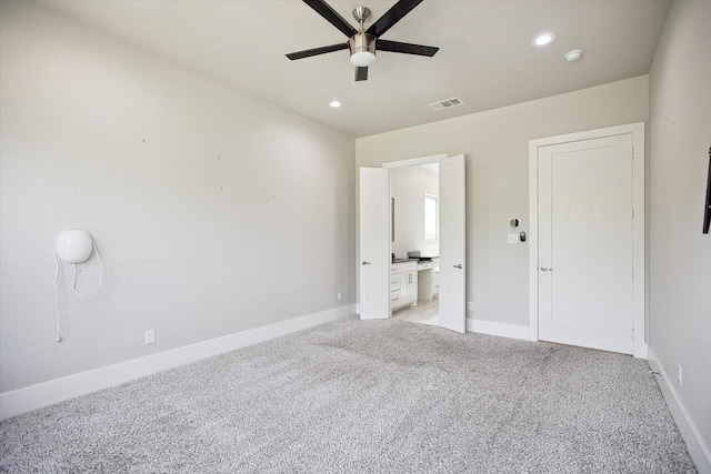interior space with visible vents, baseboards, ceiling fan, recessed lighting, and light carpet