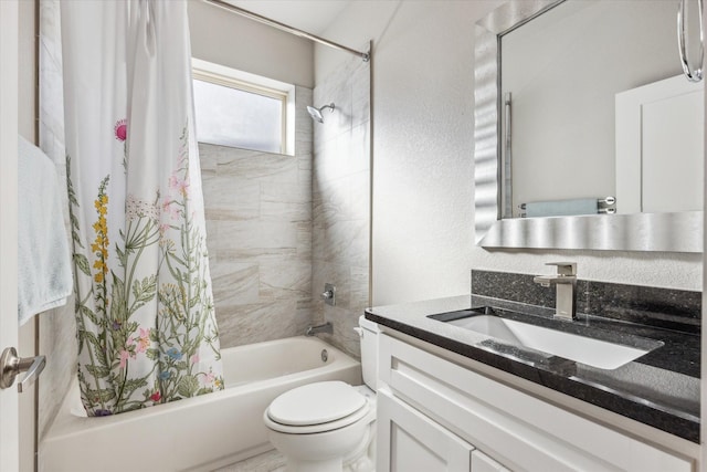 full bathroom with shower / bath combination with curtain, vanity, and toilet