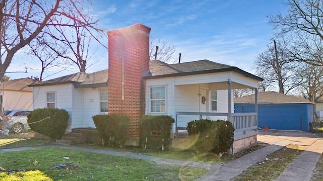 view of front facade featuring a garage and covered porch