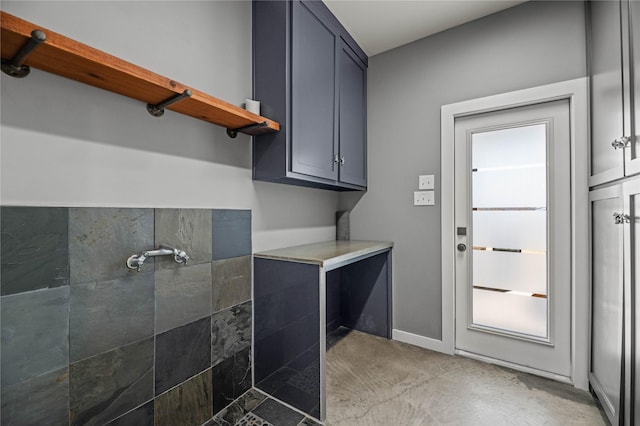 laundry area featuring a wealth of natural light