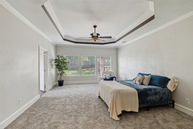 10545 Lago Vis, Quinlan, TX 75474 - carpeted bedroom with ornamental molding, a tray ceiling, baseboards, and ceiling fan
