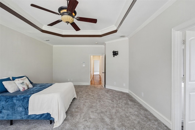 10545 Lago Vis, Quinlan, TX 75474 - carpeted bedroom with a tray ceiling, crown molding, baseboards, and ceiling fan