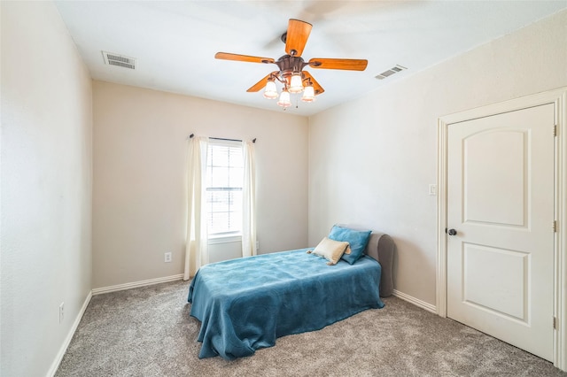 10545 Lago Vis, Quinlan, TX 75474 - carpeted bedroom with baseboards and a ceiling fan