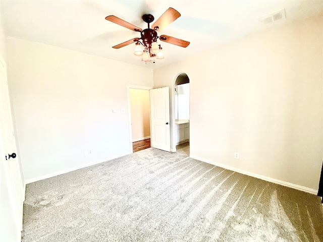 unfurnished bedroom featuring carpet floors and ceiling fan