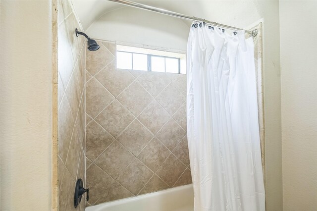 10545 Lago Vis, Quinlan, TX 75474 - bathroom featuring shower / bath combination with curtain