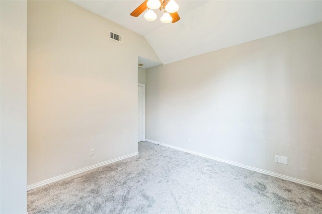 10545 Lago Vis, Quinlan, TX 75474 - empty room with carpet flooring, a ceiling fan, lofted ceiling, and baseboards
