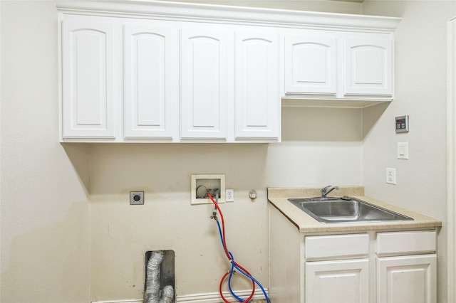 10545 Lago Vis, Quinlan, TX 75474 - laundry room with washer hookup, cabinet space, and hookup for an electric dryer