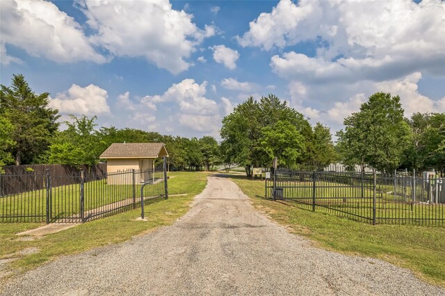 10545 Lago Vis, Quinlan, TX 75474 - view of street featuring a gated entry