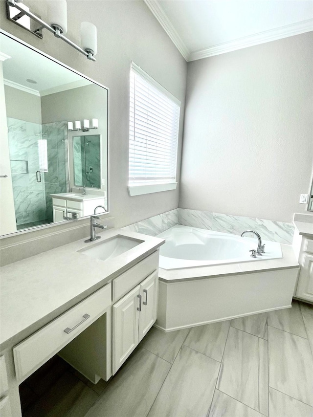 bathroom featuring a bath, a stall shower, crown molding, and vanity