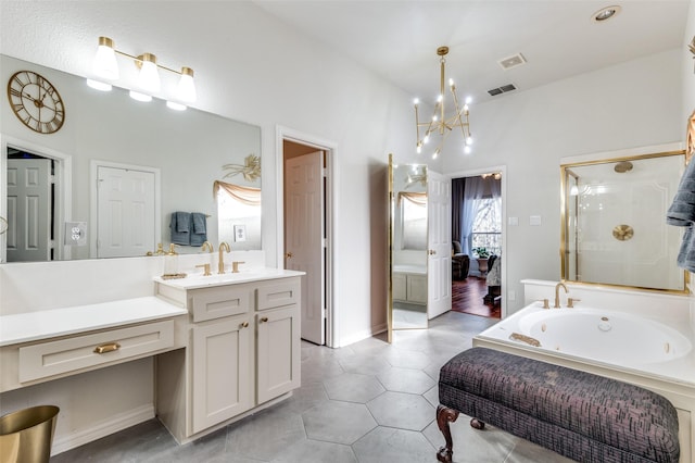 bathroom with vanity, a notable chandelier, separate shower and tub, and tile patterned flooring