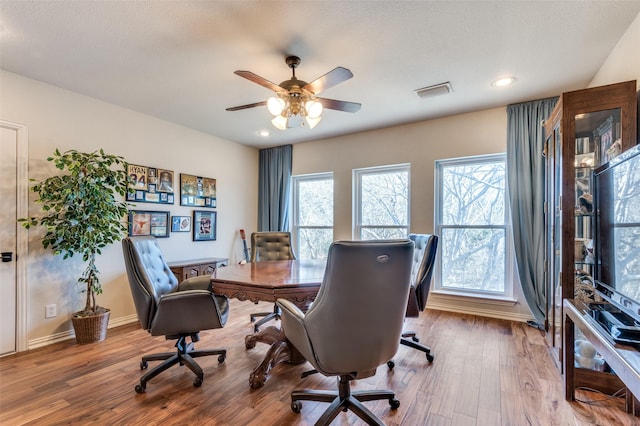 home office featuring ceiling fan and wood-type flooring