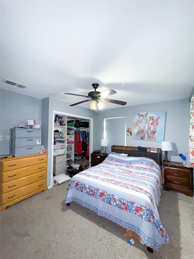 bedroom featuring a closet and ceiling fan