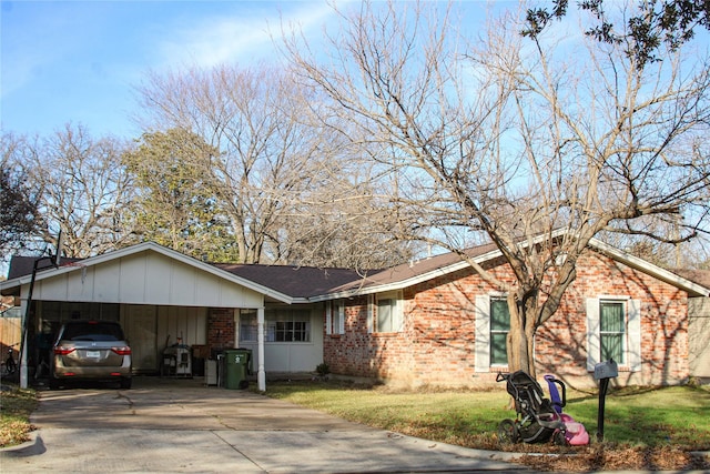 ranch-style home with a front lawn and a carport