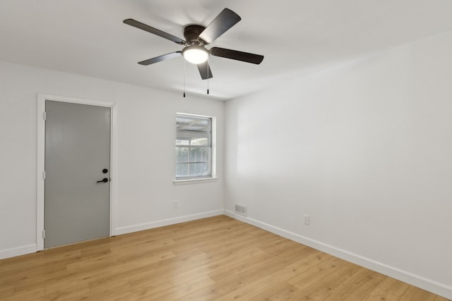 unfurnished room featuring ceiling fan and light hardwood / wood-style flooring