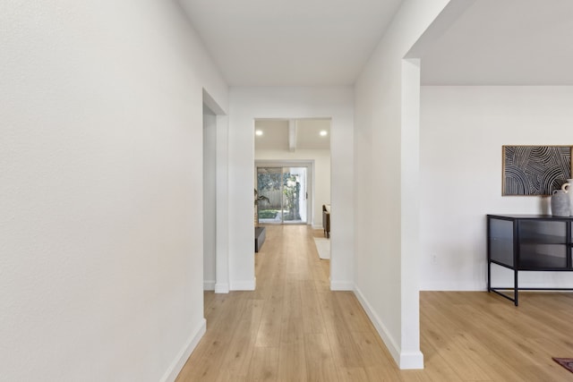 hall with light wood-type flooring