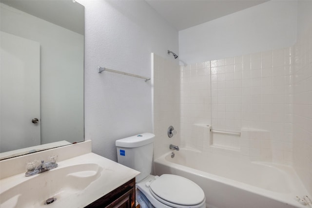 full bathroom featuring shower / bath combination, toilet, and vanity