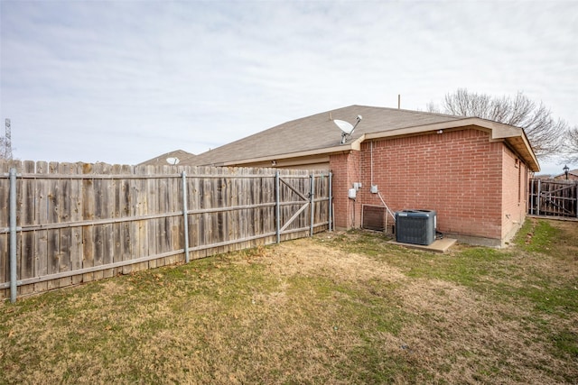 view of yard featuring central AC