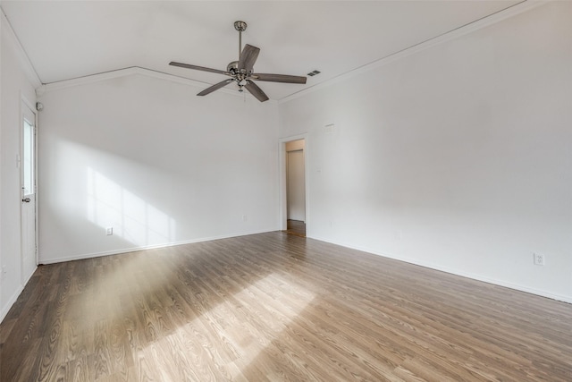 unfurnished room featuring wood-type flooring, ceiling fan, and ornamental molding