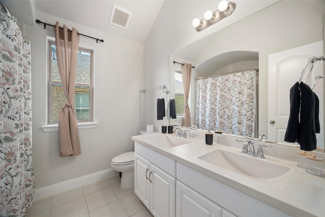 full bathroom featuring toilet, tile patterned flooring, a sink, and visible vents