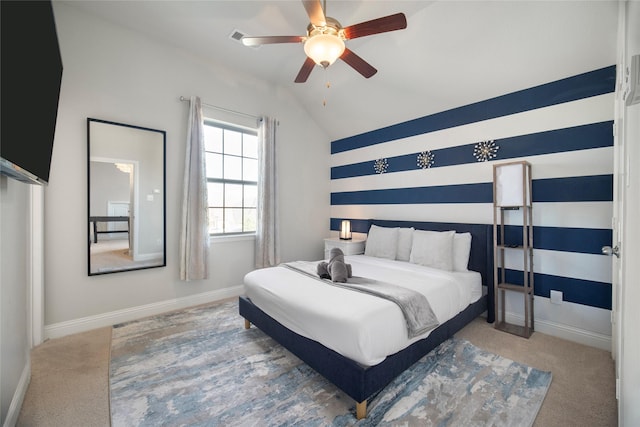 carpeted bedroom featuring ceiling fan, baseboards, and vaulted ceiling