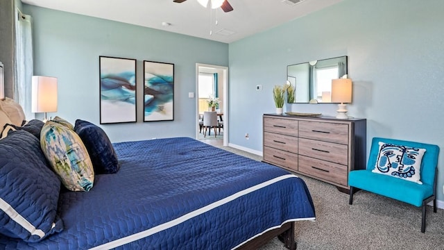 bedroom featuring ceiling fan and carpet floors