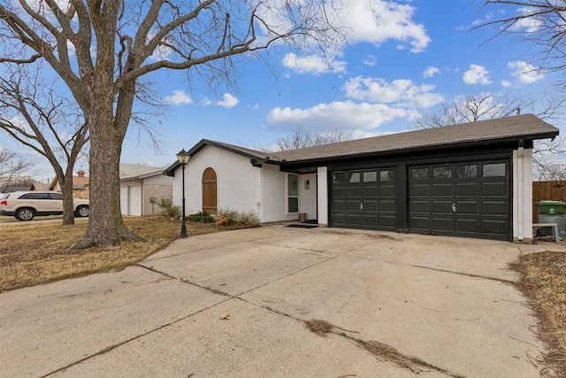 ranch-style home with a garage