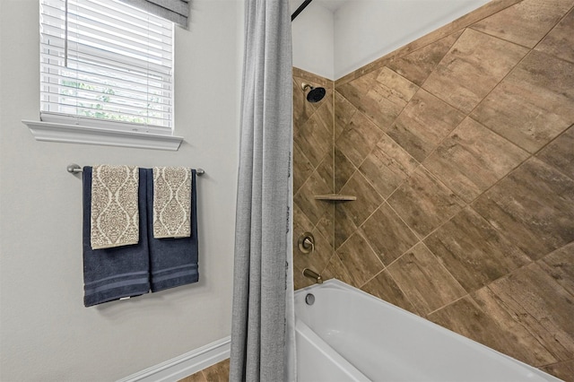 bathroom featuring shower / bath combination with curtain