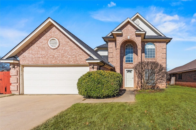 front of property featuring a garage and a front yard