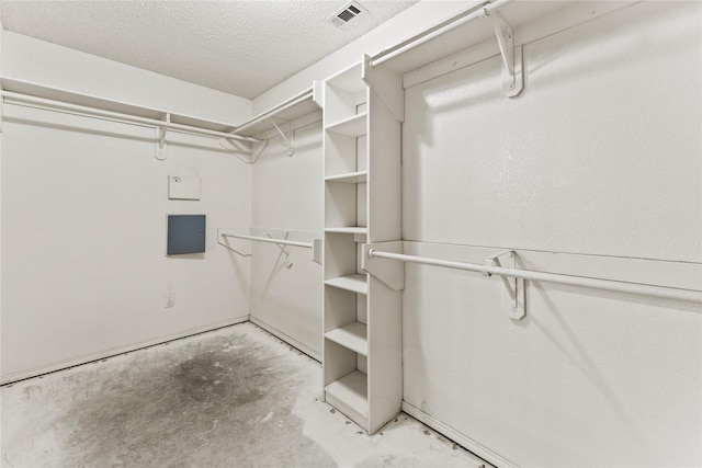 spacious closet with electric panel