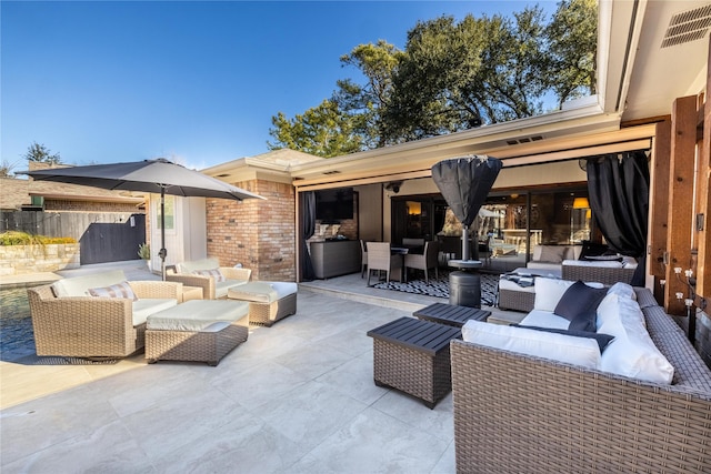 view of patio / terrace with an outdoor living space