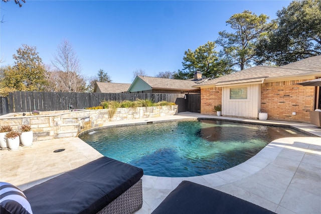 view of swimming pool featuring a patio area and pool water feature