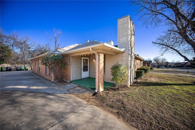 view of front of home with a front yard