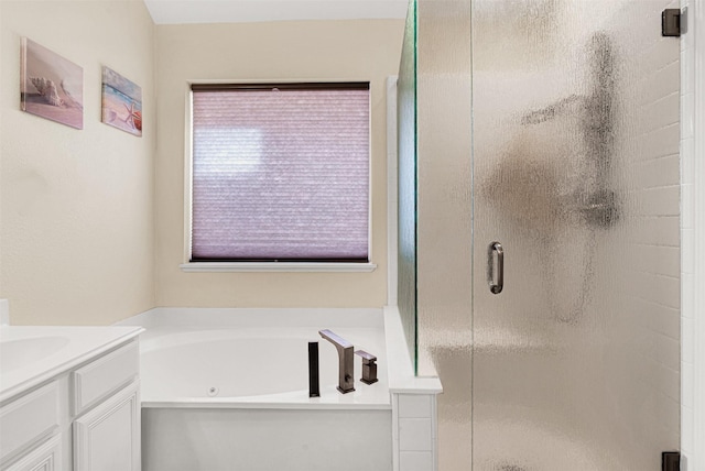 9435 Homestead Ln, Frisco, TX 75033 - full bathroom featuring a shower stall, a tub with jets, and vanity
