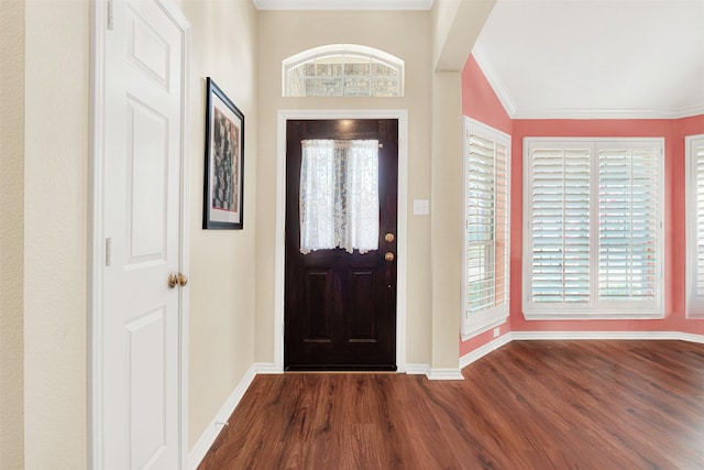 9435 Homestead Ln, Frisco, TX 75033 - foyer entrance with dark wood-style flooring, baseboards, and crown molding