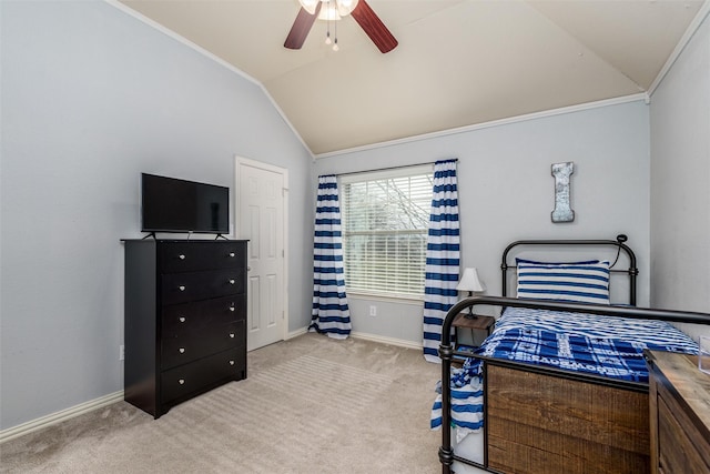 bedroom featuring ceiling fan, light colored carpet, crown molding, and vaulted ceiling