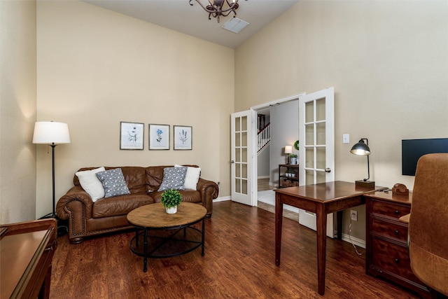 office featuring french doors, dark hardwood / wood-style floors, and high vaulted ceiling