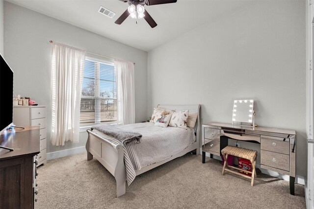 carpeted bedroom with ceiling fan