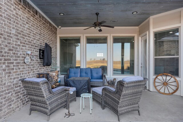 view of patio / terrace featuring ceiling fan and an outdoor hangout area