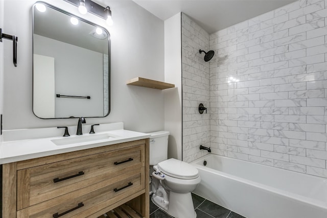 full bathroom featuring toilet, vanity, tiled shower / bath, and tile patterned flooring